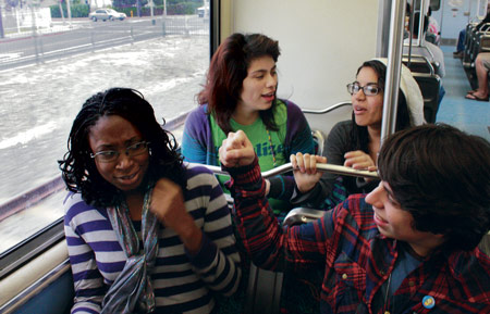 Ashley Hansack, 16, King Drew HS, and her friends recently took the Blue Line train to Long Beach and spent the day exploring. With Ashley are Jacky Garcia, 17, Lynwood HS; Edgar Mejia, 16, Venice HS; and Carla Love, 17, Ouchi HS.

Photos by Luisa Mendoza, 16, Lynwood HS