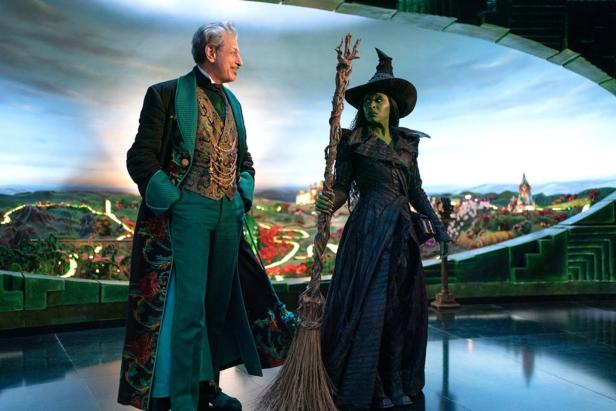 Cynthia Erivo and Jeff Goldblum stand in the Tower of the Wizard of Oz