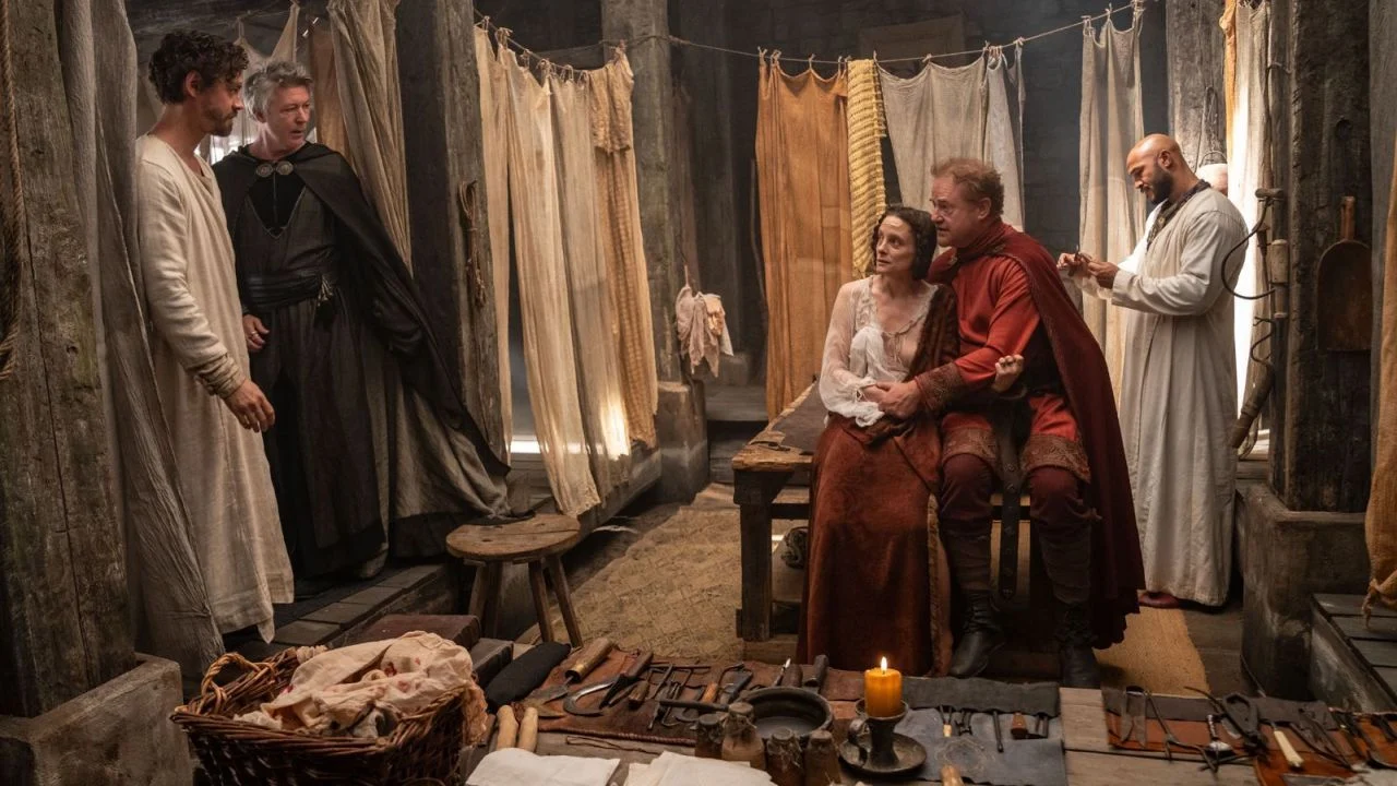 Aidan Gillen (to the left of the medicus) makes a brilliant villain!