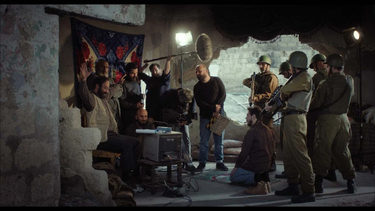 Yahya (Nader Abd Alhay) is persuaded to appear as a hero in a Hamas propaganda production.