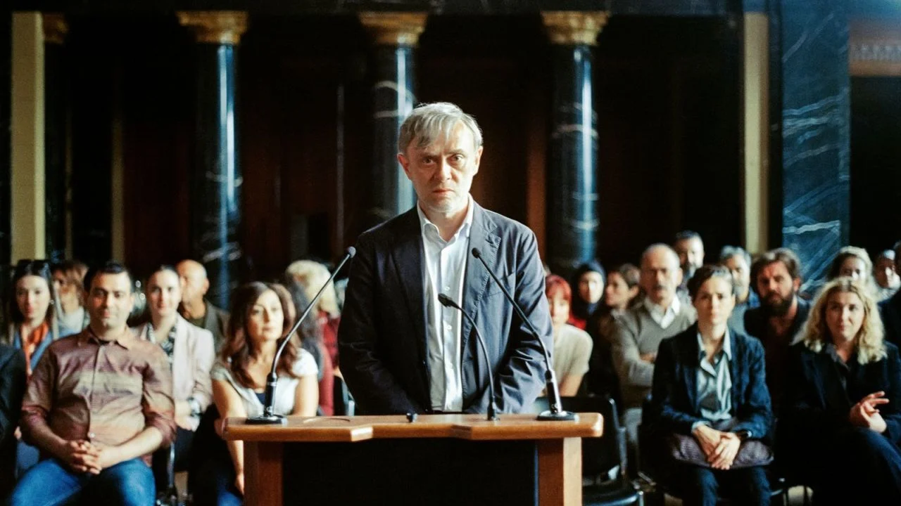 In the show trial, Aziz (Tansu Biçer) only gets three sentences to defend himself against the charges - ostensibly due to time constraints.