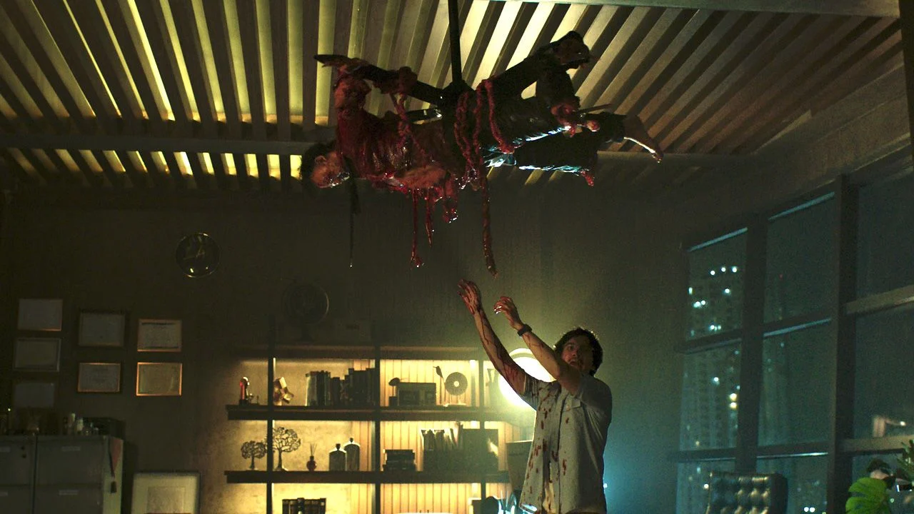 The ghost leaves the corpses brutally mauled, but not without a certain artistic quality.