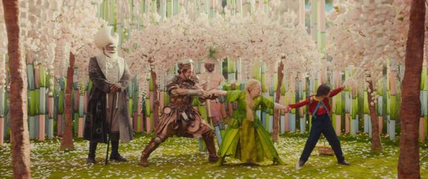 Dustin Demri-Burns, Billie Gadsdon, Nicola Coughlan, Nonso Anozie in front of a colorful natural backdrop