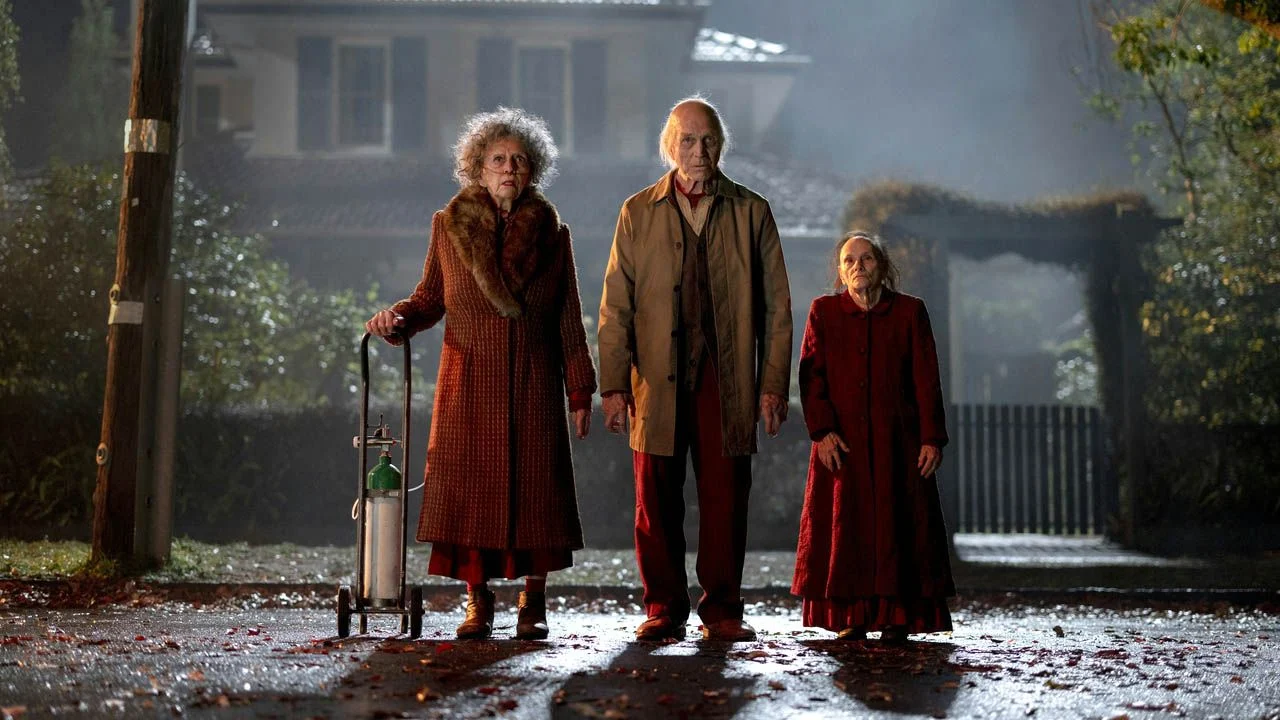 What do the creepy old people at Gemma's door want?