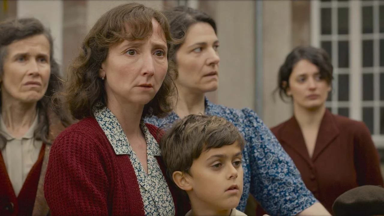 Wife Paulette (Audrey Lamy) and son Marcel (Louis Douce Lagorce) are drawn into their father's “brilliant” escape plan.