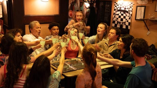 Heiner Lauterbach and Iris Berben celebrate with the other students on an art excursion