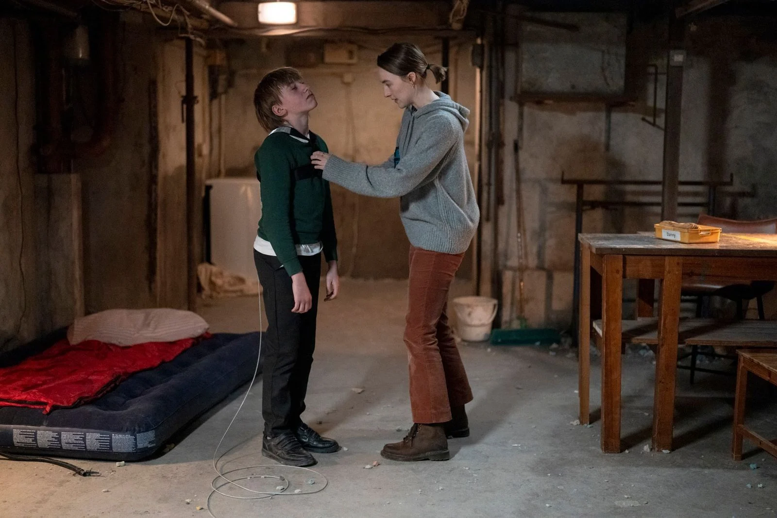 Maria (Saoirse Ronan) probably doesn't really know how exactly her student Danny (Eddie Waller) ended up locked in her basement.