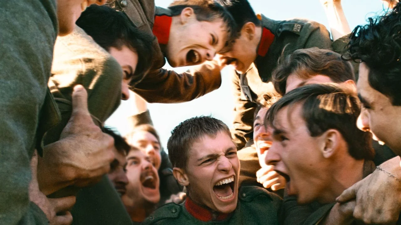 The mood is whipped up at the front: young Pierre (Emmanuel Macchia) among his comrades.