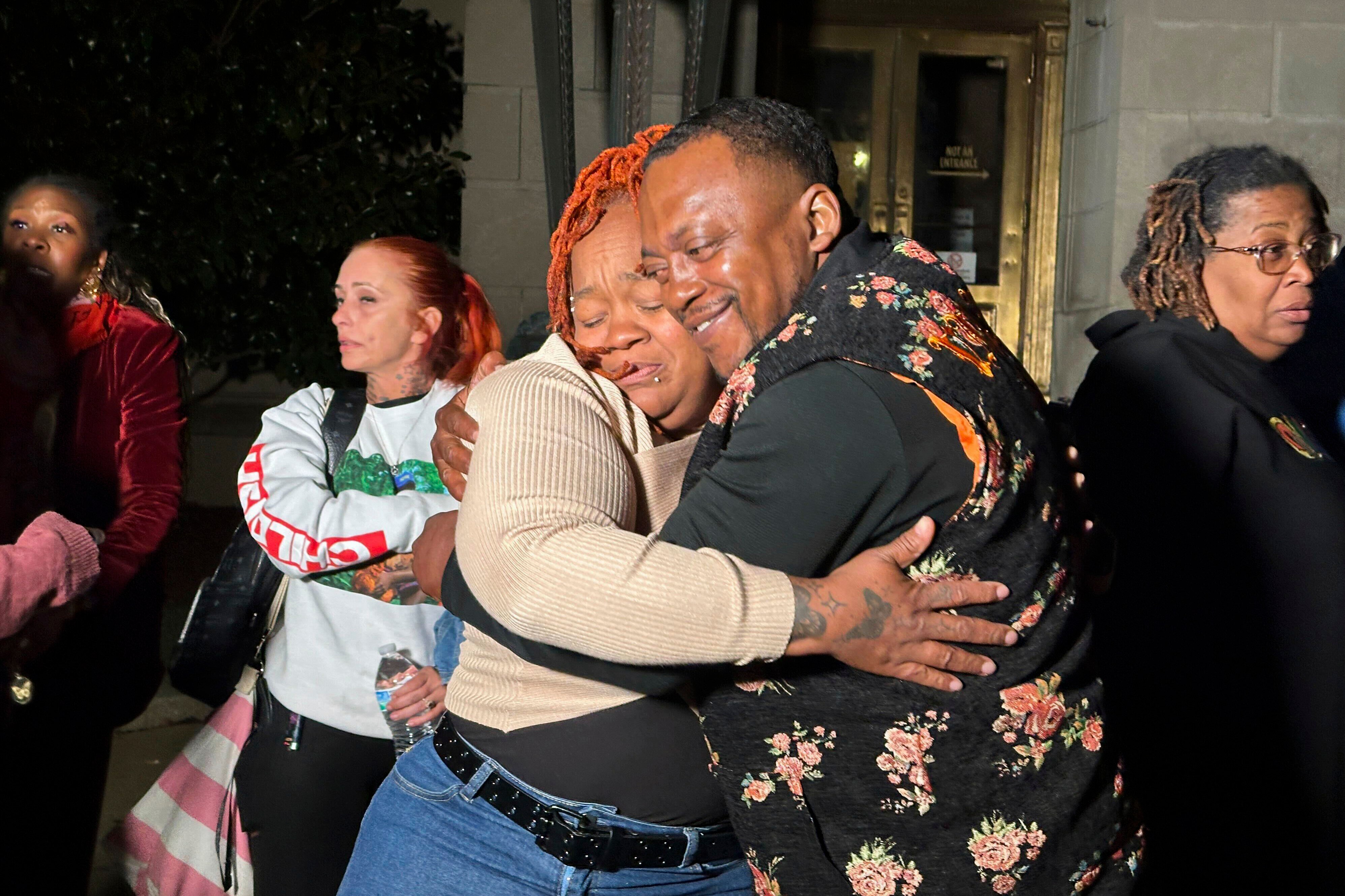 Breonna Taylor's mother, Tamika Palmer, hugs a friend in Louisville, Kentucky, on Nov. 1, 2024, after a former Kentucky police officer was convicted of using excessive force when he fired shots during the raid that left Taylor died in 2020.