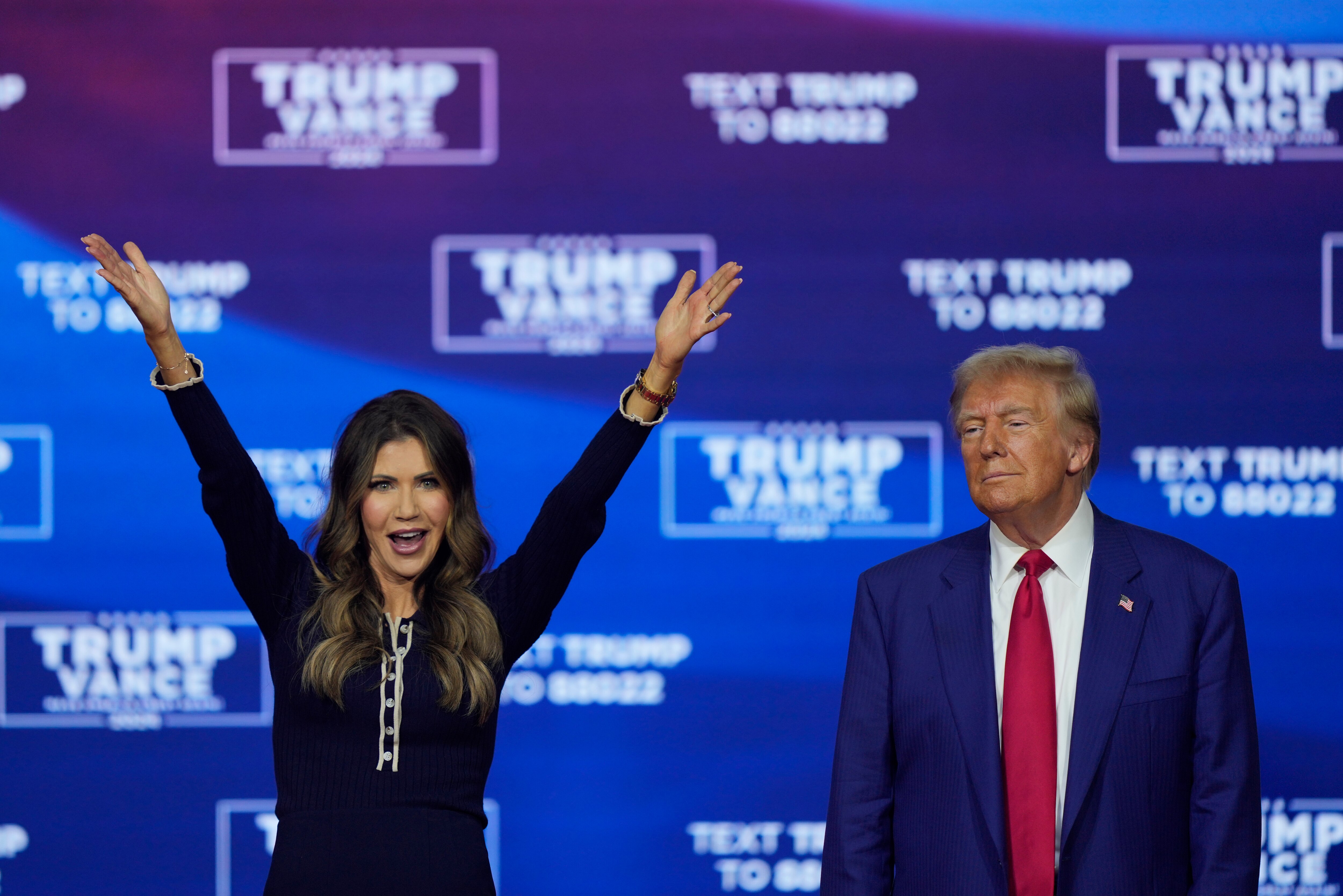 FILE - Republican presidential candidate Donald Trump and South Dakota Gov. Kristi Noem dance at a campaign rally at the Greater Philadelphia Expo Center & Fairgrounds on Oct. 14, 2024, in Oaks, Pennsylvania.