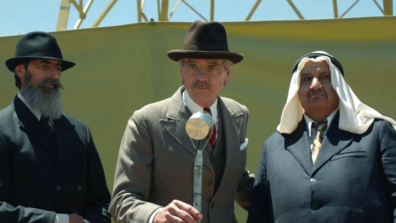 Jeremy Irons (center), who plays Wauchope, the high commissioner of the colonial administration, is a real British acting great in “Palestine 36”.