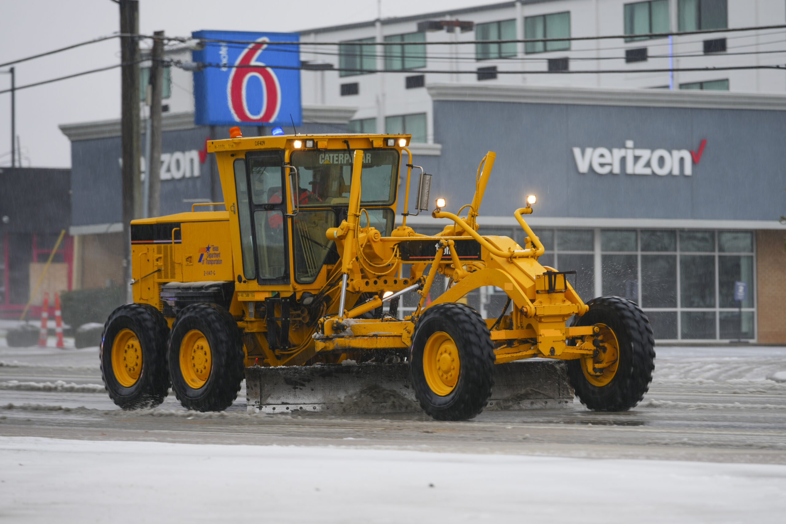 Strong winter storm causes flight cancellations and closes schools in the southern US