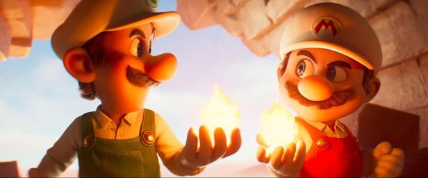 Super Mario and Luigi hold glowing balls in their hands