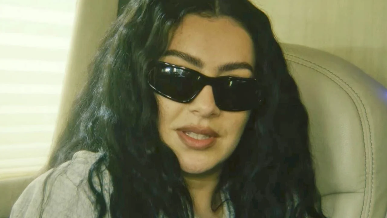 Even in her private life, pop star Charli XCX always wears her iconic sunglasses.
