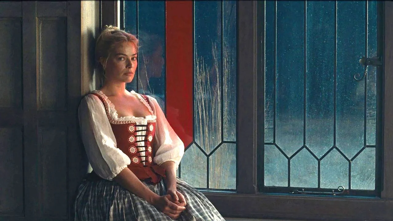 Cathy (Margot Robbie) chooses a life of decadence.